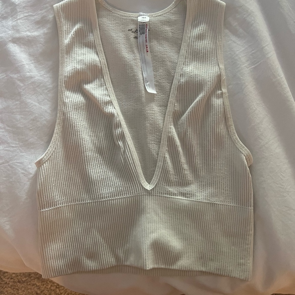 Out from under crop top